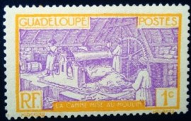 Selo postal de Guadalupe de 1928 Sugar cane in the mill