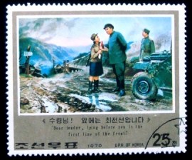 Selo postal da Coréia do Norte de 1976 On muddy road at front