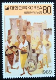 Selo postal da Coréia do Sul de 1989 A street stall by Park Laehyun