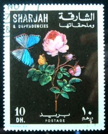 Selo postal Sharjah 1967 Hybrid tea rose and blue-gray butterfly