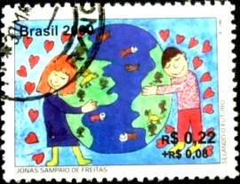 Selo postal do Brasil de 2000 Criança e Globo