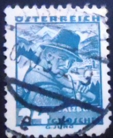 Selo postal da Áustria de 1934 Woodcutter from Zell