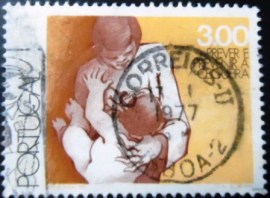 Selo postal de Portugal de 1976 Mother examining Child's Eyes