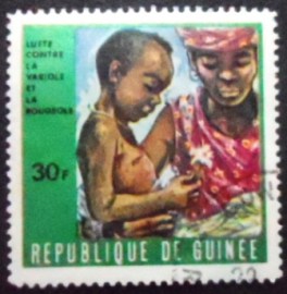Selo postal da Rep. da Guiné de 1970 Mother and sick child
