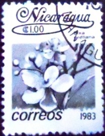 Selo postal da Nicarágua de 1983 Bixa orellana