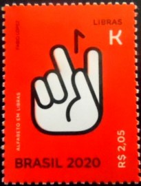 Selo postal do Brasil de 2020 Letra K em Libras