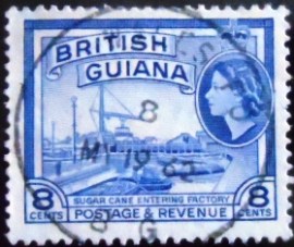 Selo postal de 1954 da Guiana Britânica Sugar cane entering factory
