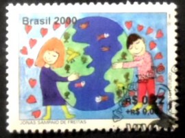 Selo postal do Brasil de 2000 Criança e Globo