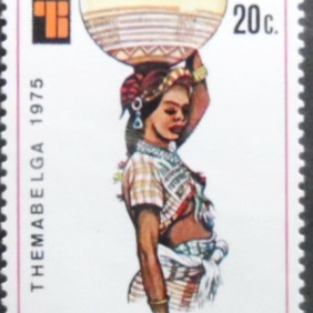 1975 - African woman with basket on head